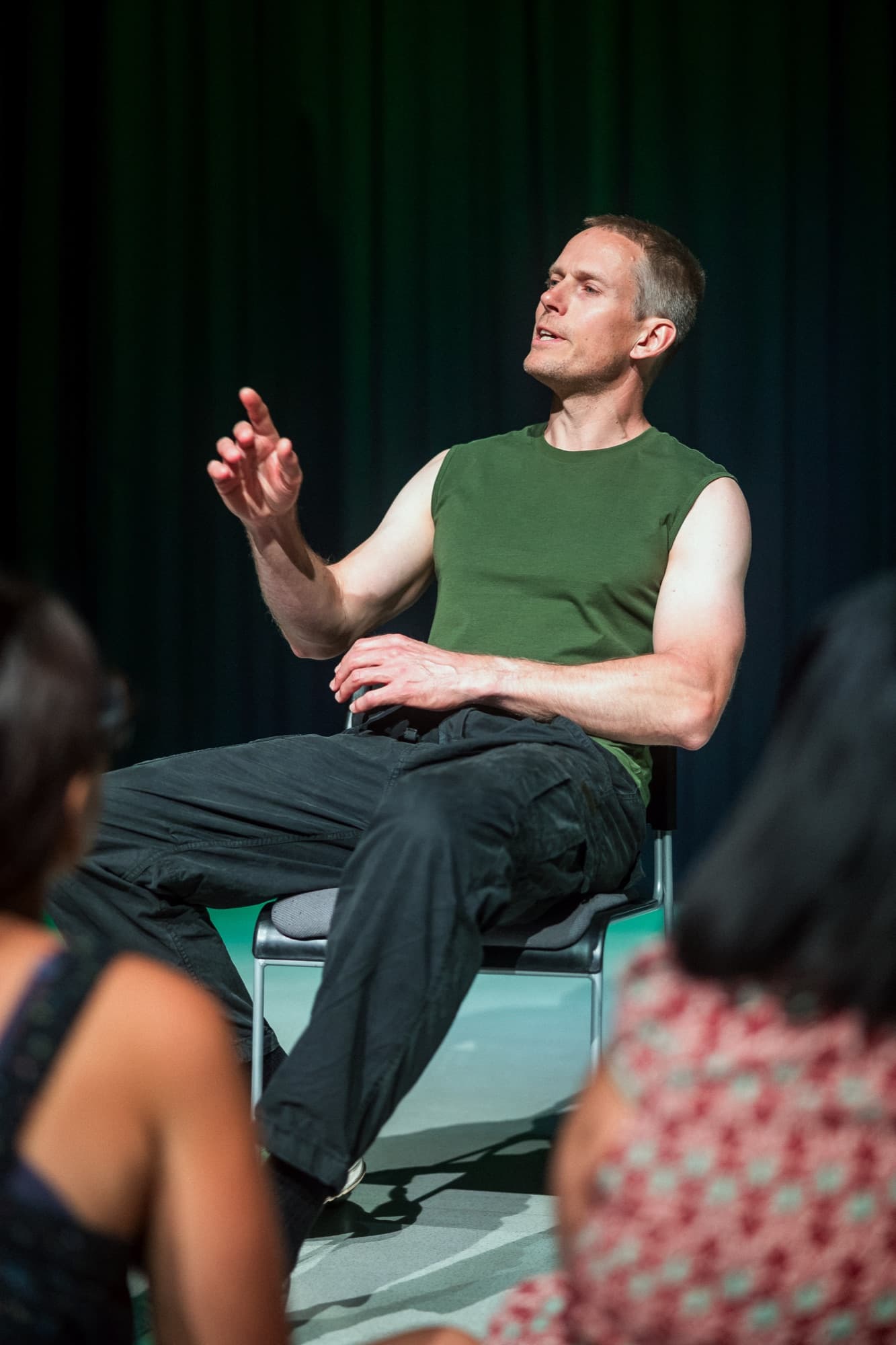 William Jukes as Johnny "Rooster" Byron in Jerusalem, seated, telling a story